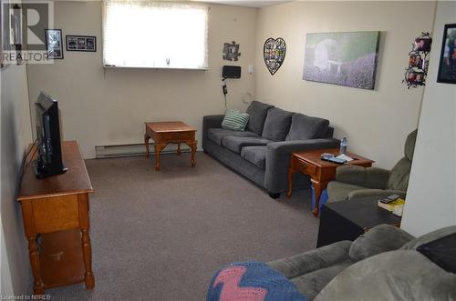 448 Main Street Unit# A,B,C & 448, Powassan, ON - Indoor Photo Showing Living Room