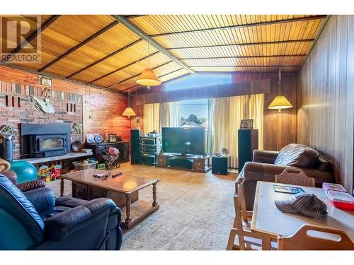 535 Arbutus Street, Chase, BC - Indoor Photo Showing Living Room With Fireplace