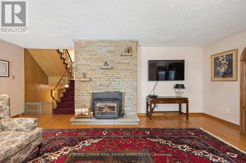 88 Waterford Drive, Toronto (Willowridge-Martingrove-Richview), ON - Indoor Photo Showing Living Room With Fireplace