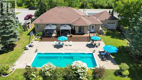 308 Metro Road N, Georgina, ON - Outdoor With In Ground Pool With Deck Patio Veranda