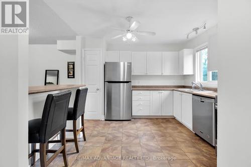 5 - 215 Commissioners Road W, London, ON - Indoor Photo Showing Kitchen With Stainless Steel Kitchen With Double Sink