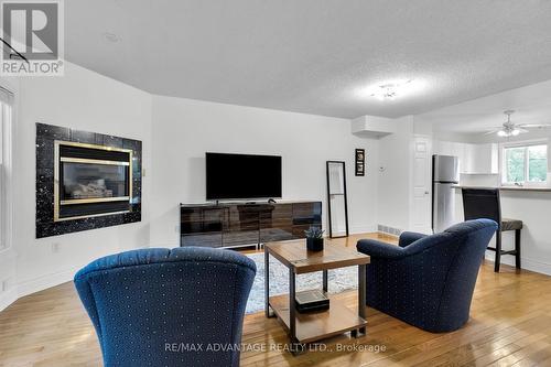 5 - 215 Commissioners Road W, London, ON - Indoor Photo Showing Living Room With Fireplace