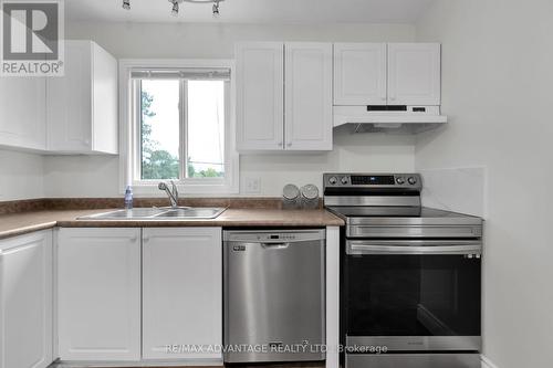 5 - 215 Commissioners Road W, London, ON - Indoor Photo Showing Kitchen With Stainless Steel Kitchen With Double Sink