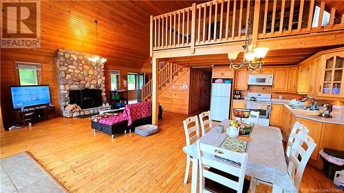 41 Mcneil, Sea Side, NB - Indoor Photo Showing Dining Room With Fireplace