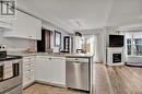 263 Bowen Drive, Peterborough (Northcrest), ON  - Indoor Photo Showing Kitchen With Fireplace With Stainless Steel Kitchen With Double Sink 