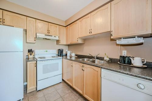 565 Rymal Road E|Unit #43, Hamilton, ON - Indoor Photo Showing Kitchen With Double Sink