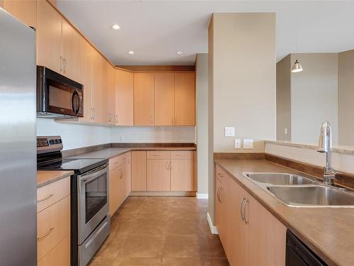 309-330 Waterfront Cres, Victoria, BC - Indoor Photo Showing Kitchen With Double Sink