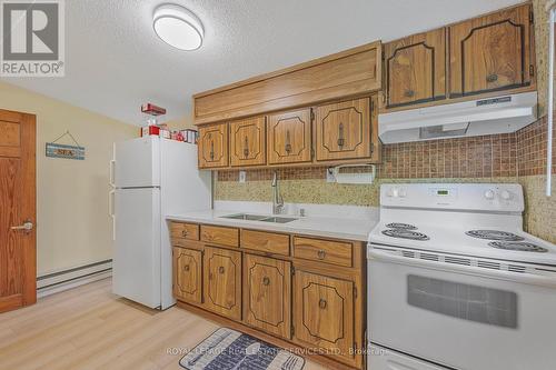 34 Nancy & Part 2 & 3 Street, Wasaga Beach, ON - Indoor Photo Showing Kitchen With Double Sink