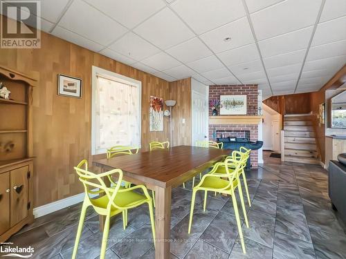 3 Harris Lake Road, Parry Sound, Unorganized, Centre Part, ON - Indoor Photo Showing Dining Room With Fireplace