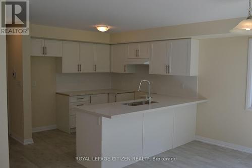 13 Revol Road, Penetanguishene, ON - Indoor Photo Showing Kitchen With Double Sink