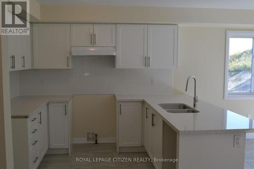 13 Revol Road, Penetanguishene, ON - Indoor Photo Showing Kitchen With Double Sink