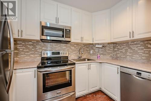 705 - 1 Lomond Drive, Toronto (Islington-City Centre West), ON - Indoor Photo Showing Kitchen With Upgraded Kitchen