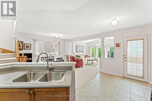 7309 Cork Tree Row, Mississauga (Lisgar), ON - Indoor Photo Showing Kitchen With Double Sink