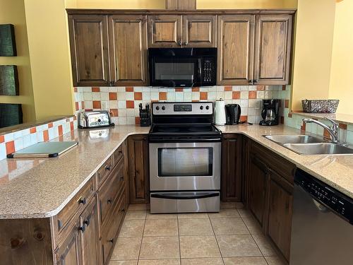 1351 Gerry Sorensen Way Unit# P2-B, Kimberley, BC - Indoor Photo Showing Kitchen With Double Sink