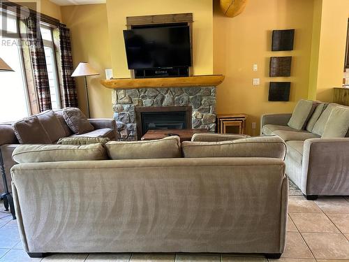 1351 Gerry Sorensen Way Unit# P2-B, Kimberley, BC - Indoor Photo Showing Living Room With Fireplace