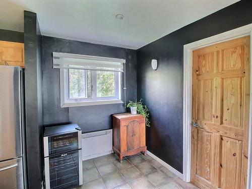 Salon - 1046 Ch. Bouchard, Rouyn-Noranda, QC - Indoor Photo Showing Living Room With Fireplace