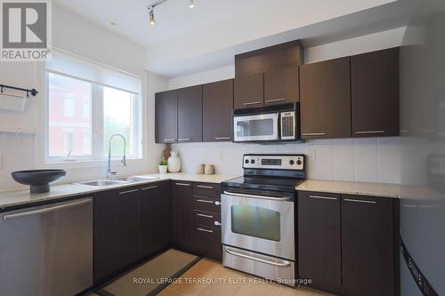 45 - 28 Times Avenue, Markham (Commerce Valley), ON - Indoor Photo Showing Kitchen With Double Sink