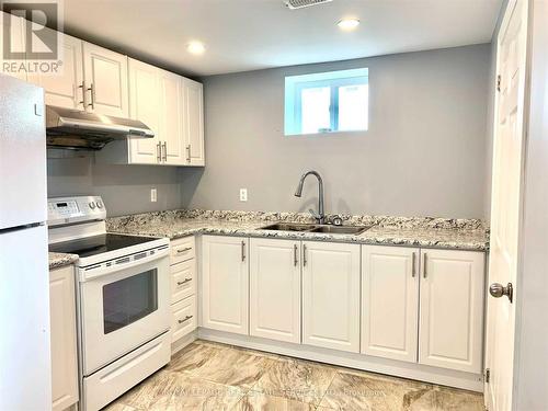 1987 Truscott Drive, Mississauga, ON - Indoor Photo Showing Kitchen With Double Sink