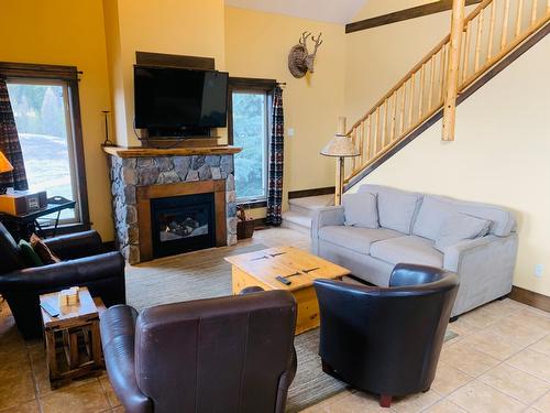 D5-D - 1351 Gerry Sorensen Way, Kimberley, BC - Indoor Photo Showing Living Room With Fireplace