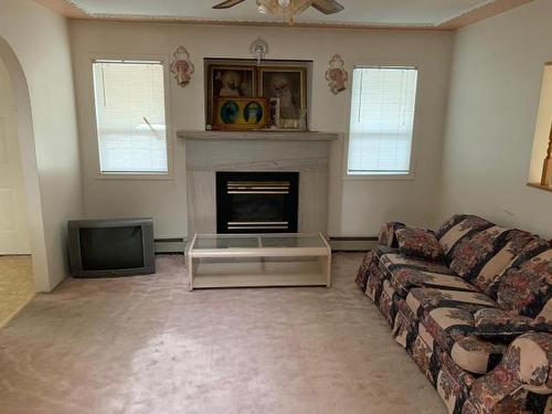 2651 Coutlee Ave, Merritt, BC - Indoor Photo Showing Living Room With Fireplace