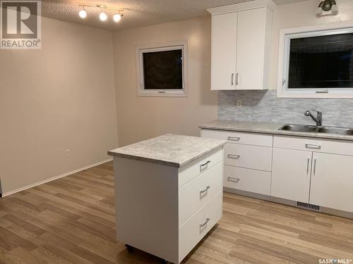 44 Campbell Place, Clavet, SK - Indoor Photo Showing Kitchen With Double Sink