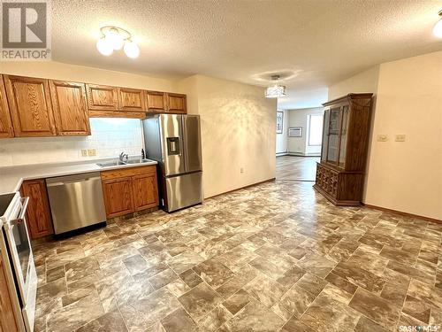 303 62 24Th Street, Battleford, SK - Indoor Photo Showing Kitchen With Double Sink