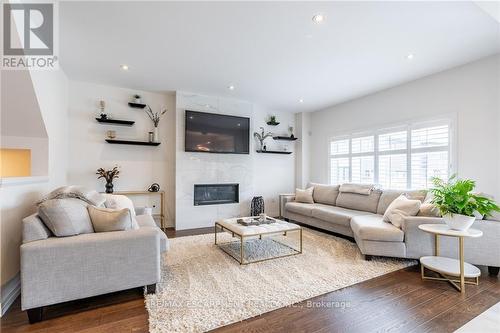 28 Columbus Gate, Hamilton, ON - Indoor Photo Showing Living Room With Fireplace