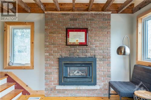 1418 Stittsville Main Street, Stittsville, ON - Indoor Photo Showing Living Room With Fireplace