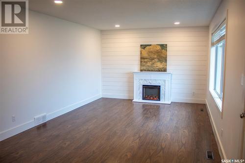 209 4Th Avenue S, St. Brieux, SK - Indoor Photo Showing Living Room With Fireplace