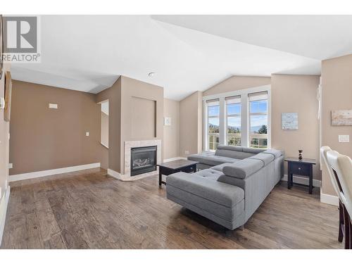 5169 South Ridge Drive, Kelowna, BC - Indoor Photo Showing Living Room With Fireplace