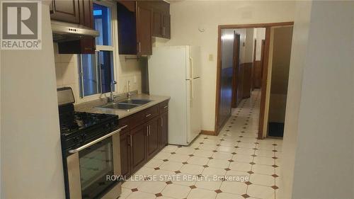 36 Mitchell Avenue, Toronto, ON - Indoor Photo Showing Kitchen With Double Sink