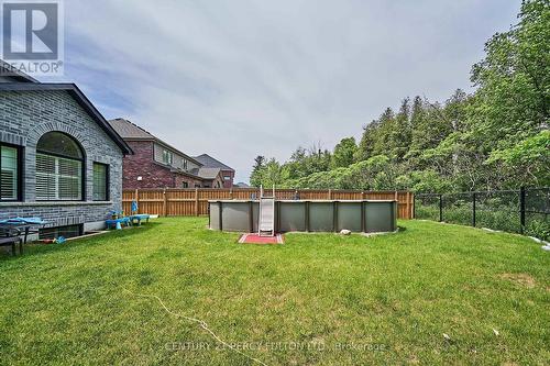 43 Harry Lee Crescent, Clarington (Bowmanville), ON - Outdoor With Above Ground Pool With Backyard