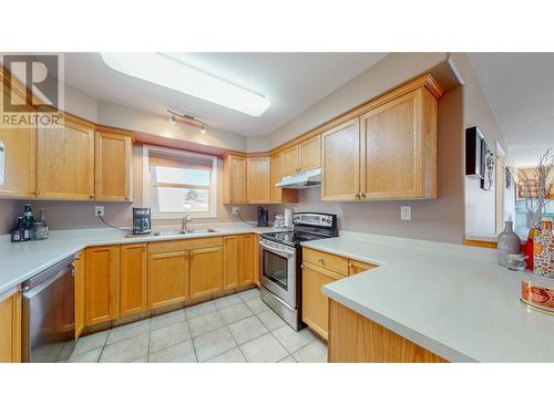 9307 62Nd Avenue Unit# 211, Osoyoos, BC - Indoor Photo Showing Kitchen With Double Sink