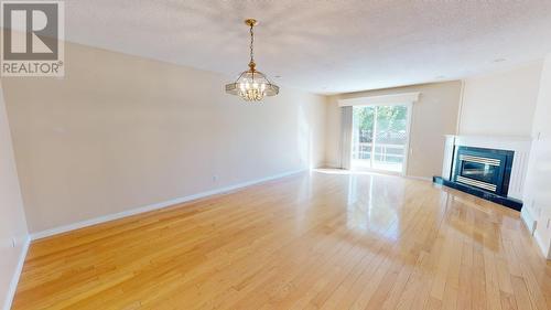 10120 108 Avenue, Fort St. John, BC - Indoor Photo Showing Other Room With Fireplace