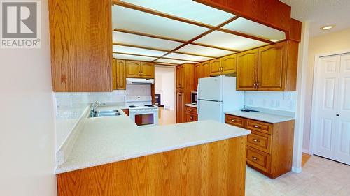 10120 108 Avenue, Fort St. John, BC - Indoor Photo Showing Kitchen With Double Sink