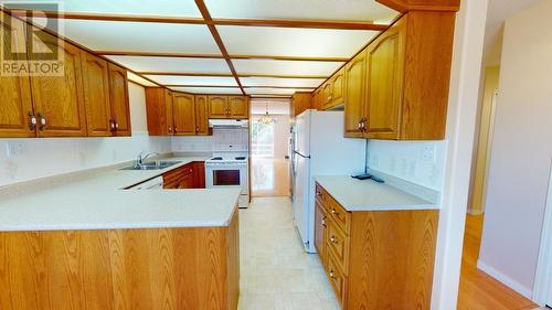 10120 108 Avenue, Fort St. John, BC - Indoor Photo Showing Kitchen With Double Sink