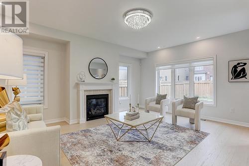 10 John Weddell Avenue, East Gwillimbury, ON - Indoor Photo Showing Living Room With Fireplace