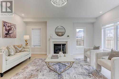 10 John Weddell Avenue, East Gwillimbury, ON - Indoor Photo Showing Living Room With Fireplace