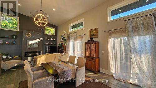 38 Betty Boulevard, Wasaga Beach, ON - Indoor Photo Showing Dining Room With Fireplace