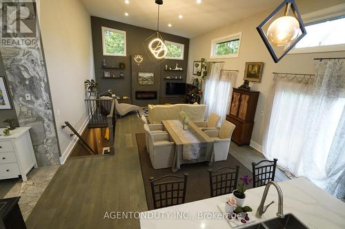 38 Betty Boulevard, Wasaga Beach, ON - Indoor Photo Showing Dining Room With Fireplace