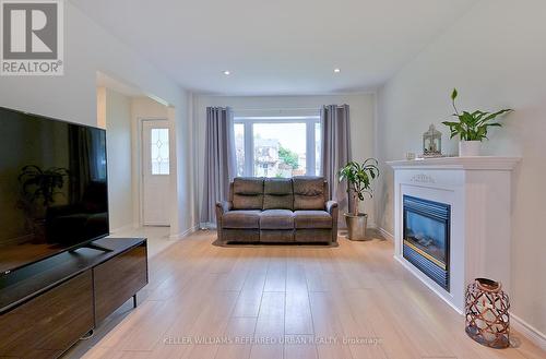 155 Vauxhall Drive, Toronto (Dorset Park), ON - Indoor Photo Showing Living Room With Fireplace