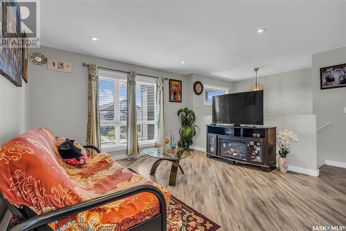 314 Bentley Lane, Saskatoon, SK - Indoor Photo Showing Living Room With Fireplace