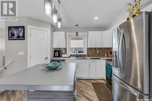 314 Bentley Lane, Saskatoon, SK - Indoor Photo Showing Kitchen With Double Sink