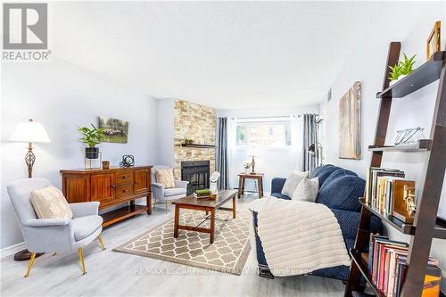 116 - 78 Roehampton Avenue, St. Catharines, ON - Indoor Photo Showing Living Room With Fireplace