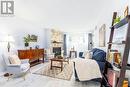 116 - 78 Roehampton Avenue, St. Catharines, ON  - Indoor Photo Showing Living Room With Fireplace 