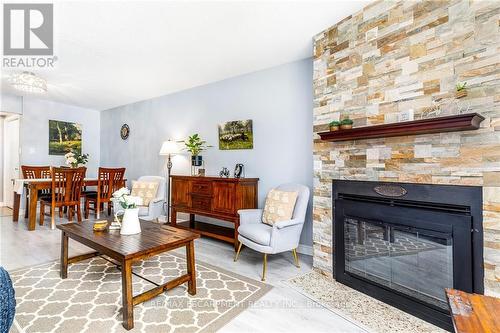 116 - 78 Roehampton Avenue, St. Catharines, ON - Indoor Photo Showing Living Room With Fireplace