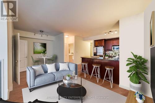 310 - 77 Mcmurrich Street, Toronto, ON - Indoor Photo Showing Living Room