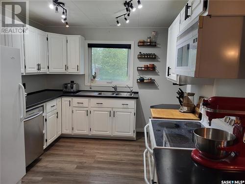 713 Beharrel Street, Oxbow, SK - Indoor Photo Showing Kitchen With Double Sink