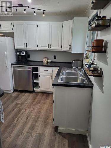 713 Beharrel Street, Oxbow, SK - Indoor Photo Showing Kitchen With Double Sink