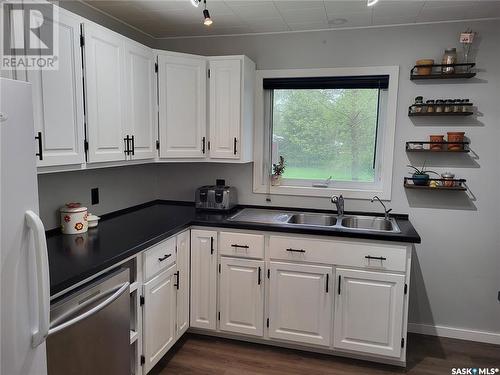 713 Beharrel Street, Oxbow, SK - Indoor Photo Showing Kitchen With Double Sink